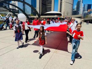 children and polish flag in Toronto